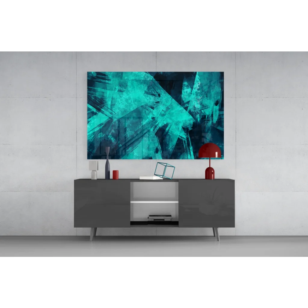 Vibrant teal abstract glass wall art with geometric brushstrokes above gray console