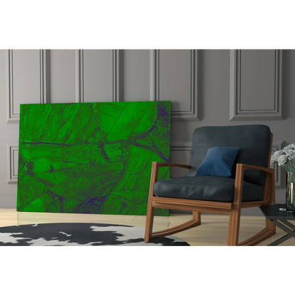 Vibrant green abstract glass wall art with purple swirls on paneled wall