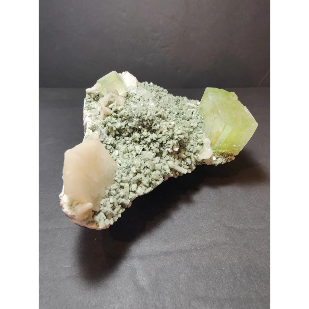 Green apophyllite cubes with peach stilbite on heulandite specimen