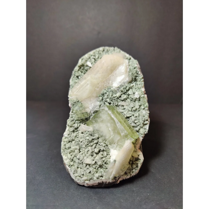 Green apophyllite cubes with peach stilbite on heulandite specimen