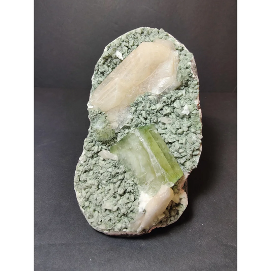 Green apophyllite cubes with peach stilbite on heulandite specimen