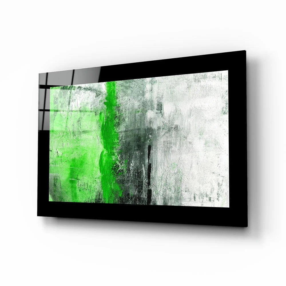 Bold green streak glass wall art in black frame on textured background