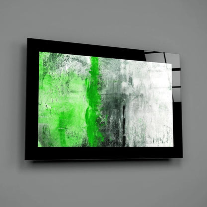 Bold green streak glass wall art in black frame with abstract strokes
