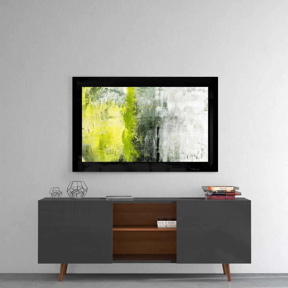 Bold abstract wall art in black frame with yellow and green strokes