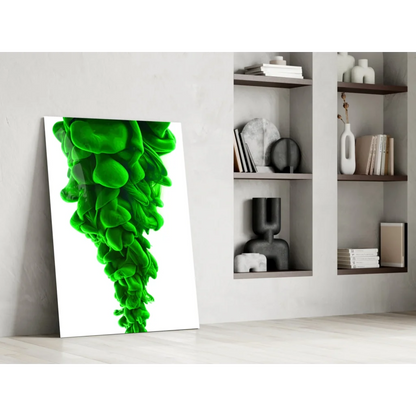 Vibrant green swirl glass wall art leaning on white wall