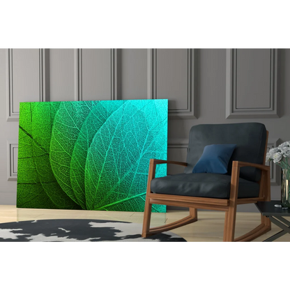 Vibrant green and teal tropical leaf canvas wall art with intricate vein details