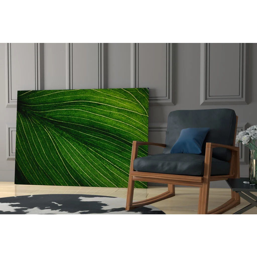 Vibrant green leaf glass wall art with intricate vein details