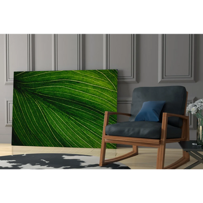 Vibrant green leaf glass wall art with intricate vein details