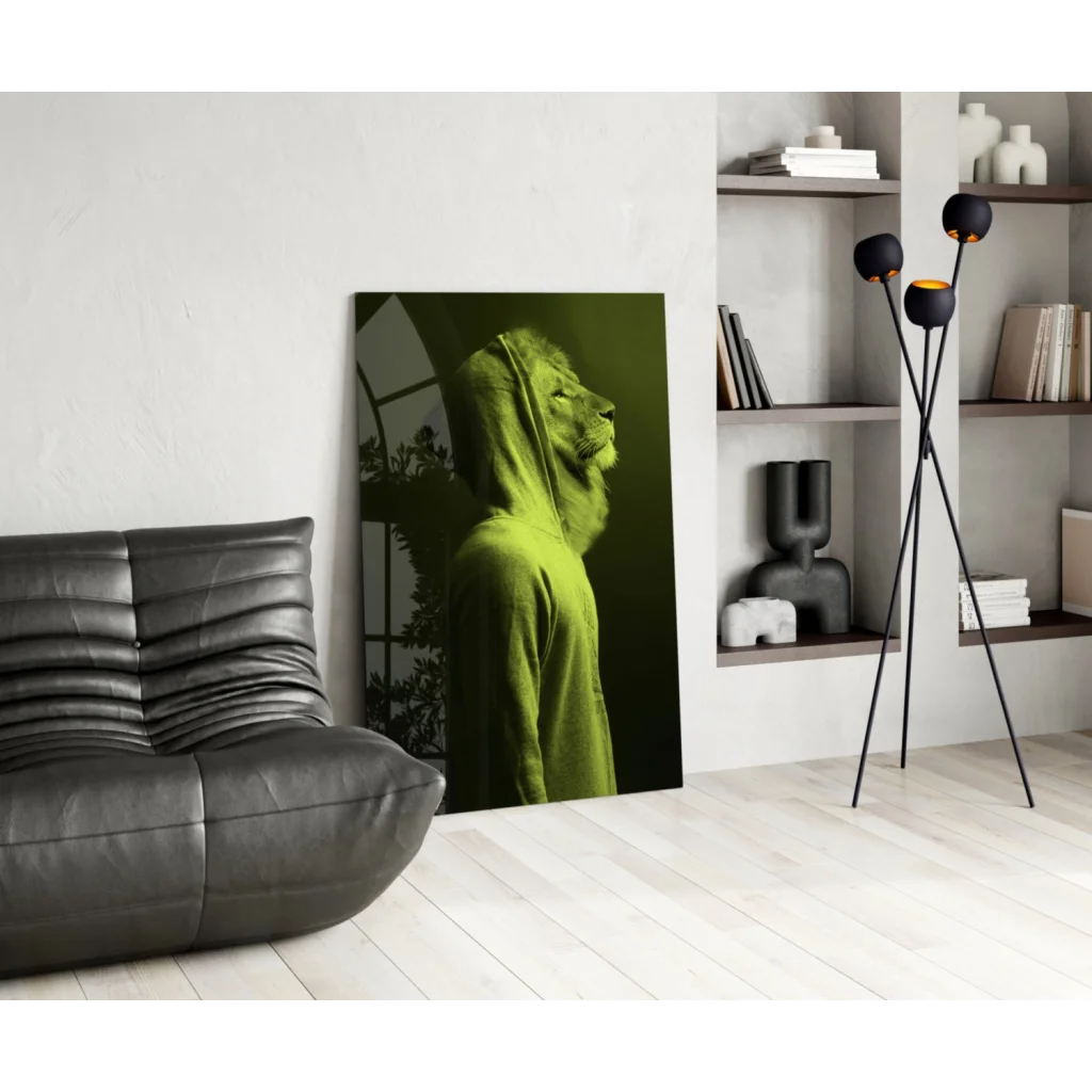 Striking hooded lion glass wall art on green canvas against white wall