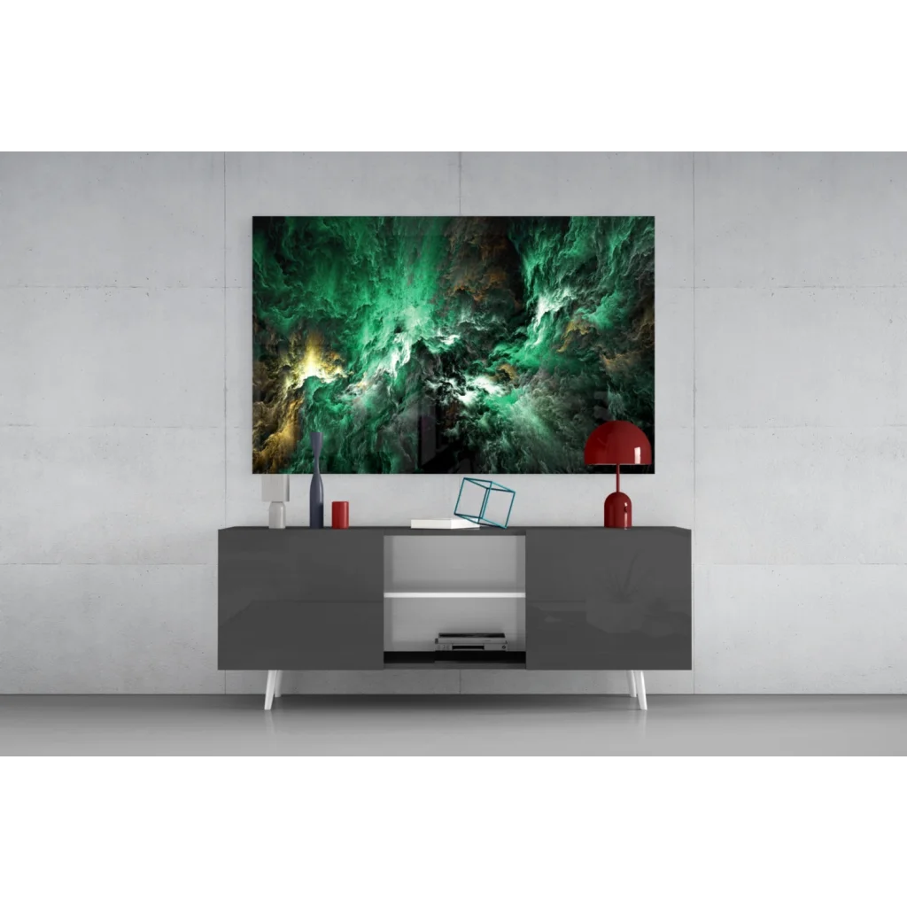 Vibrant emerald nebula glass wall art with golden cosmic swirls on gray console