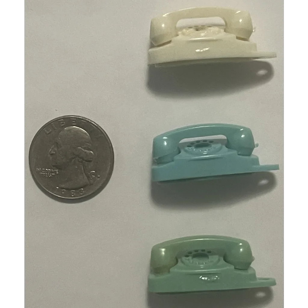 Miniature pastel toy telephones from the Groovy Vintage 1960s Green Princess collection