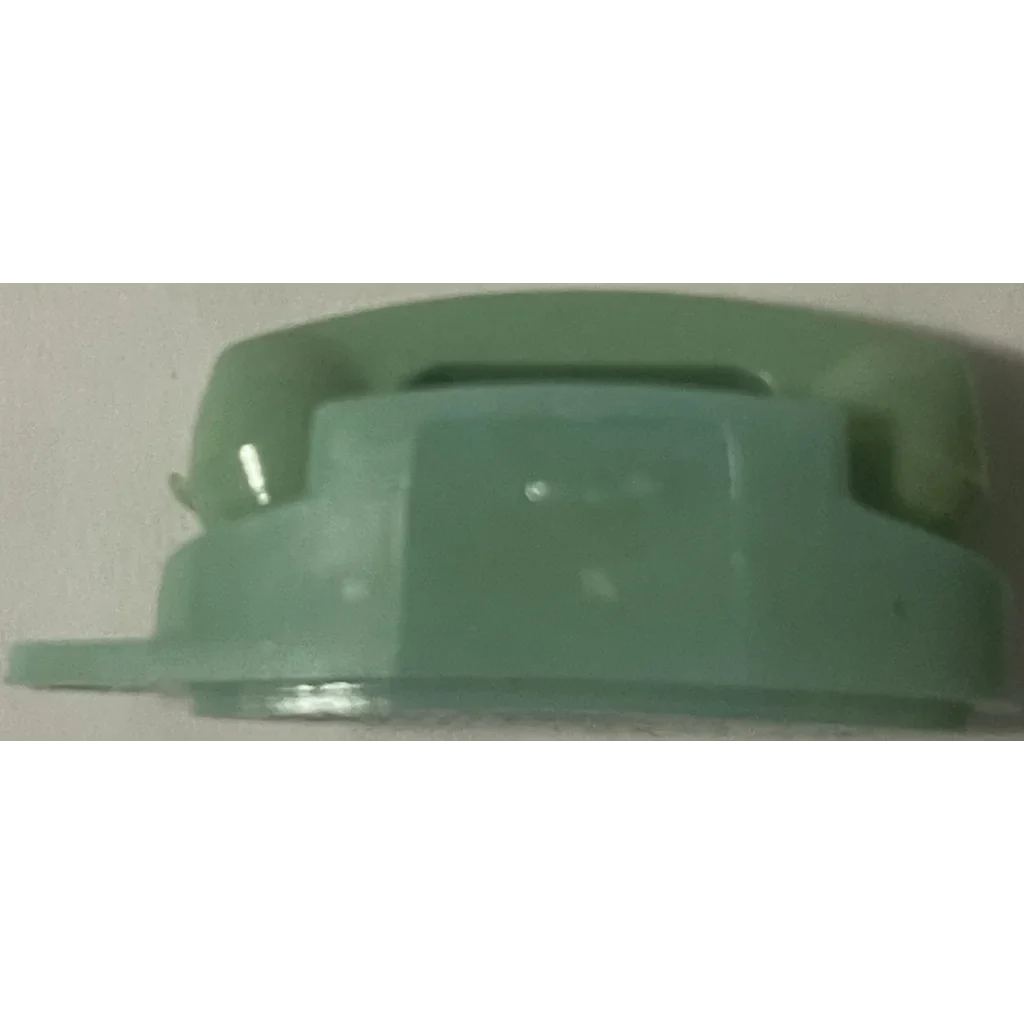 Mint green plastic lid for a 1960s Green Princess Phones Keychain with a stylish slot