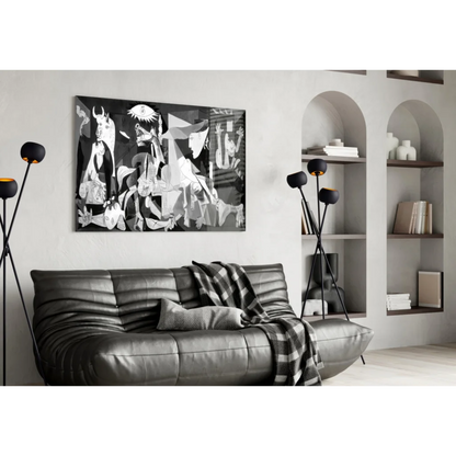 Picasso style cubist eye black and white abstract wall art above gray sofa