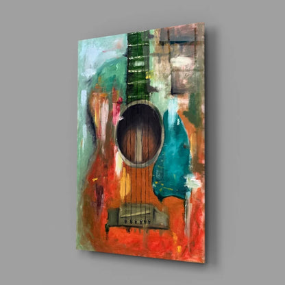 Abstract vibrant guitar on glass wall art with orange teal green strokes
