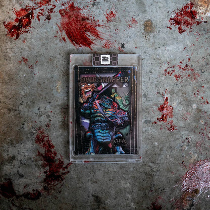 Trading card featuring a monstrous muscular creature in protective case GWAR Bonesnapper
