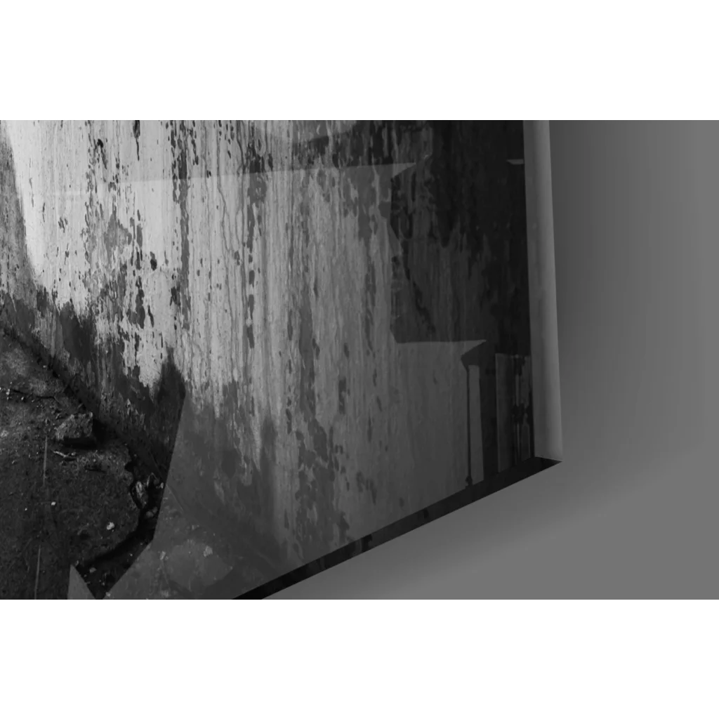 Black and white urban concrete wall art print of weathered peeling wall with mold