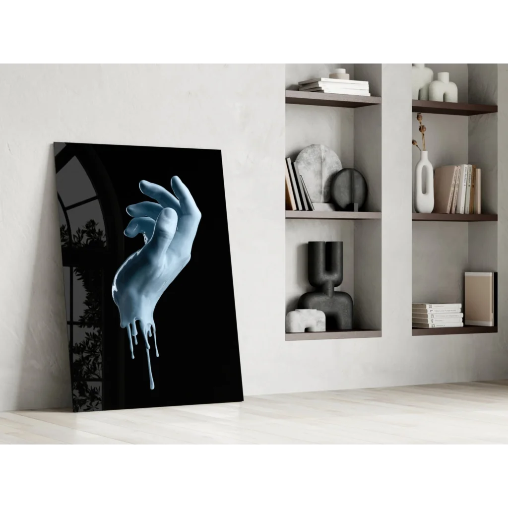 Striking blue dripping hand glass wall art canvas print on glossy finish