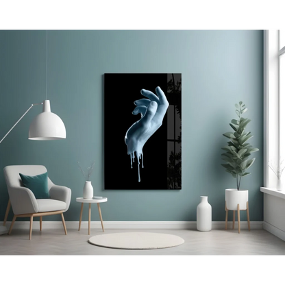Striking dripping blue hand glass wall art canvas print in black and white
