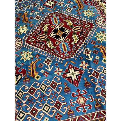 Vibrant blue Hand Knotted Afghan Kazak rug with cotton foundation and geometric floral patterns