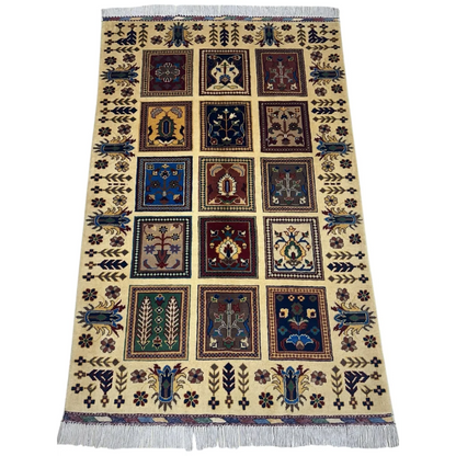Afghan Bakhteiari hand-knotted rug in cream with cotton foundation and colorful floral garden panels