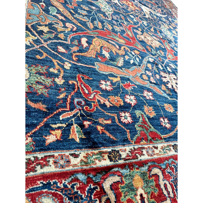 Hand-knotted Afghani Bidjar Ghazni wool rug with deep blue floral and bird motifs