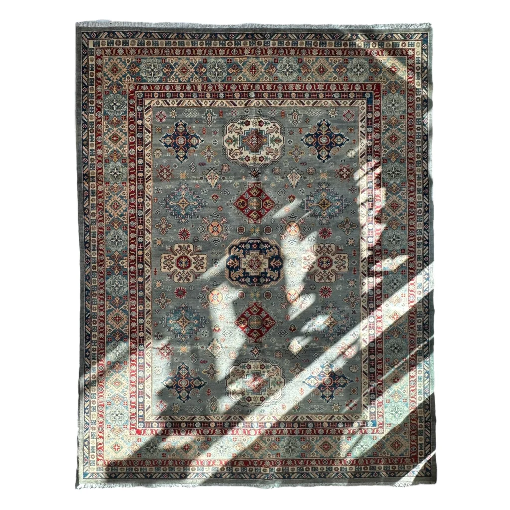 Hand-knotted Afghani Kazak wool rug with natural dyes, geometric patterns