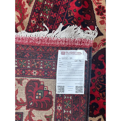 Hand-knotted Afghan heart shape rug in red and beige on cotton foundation