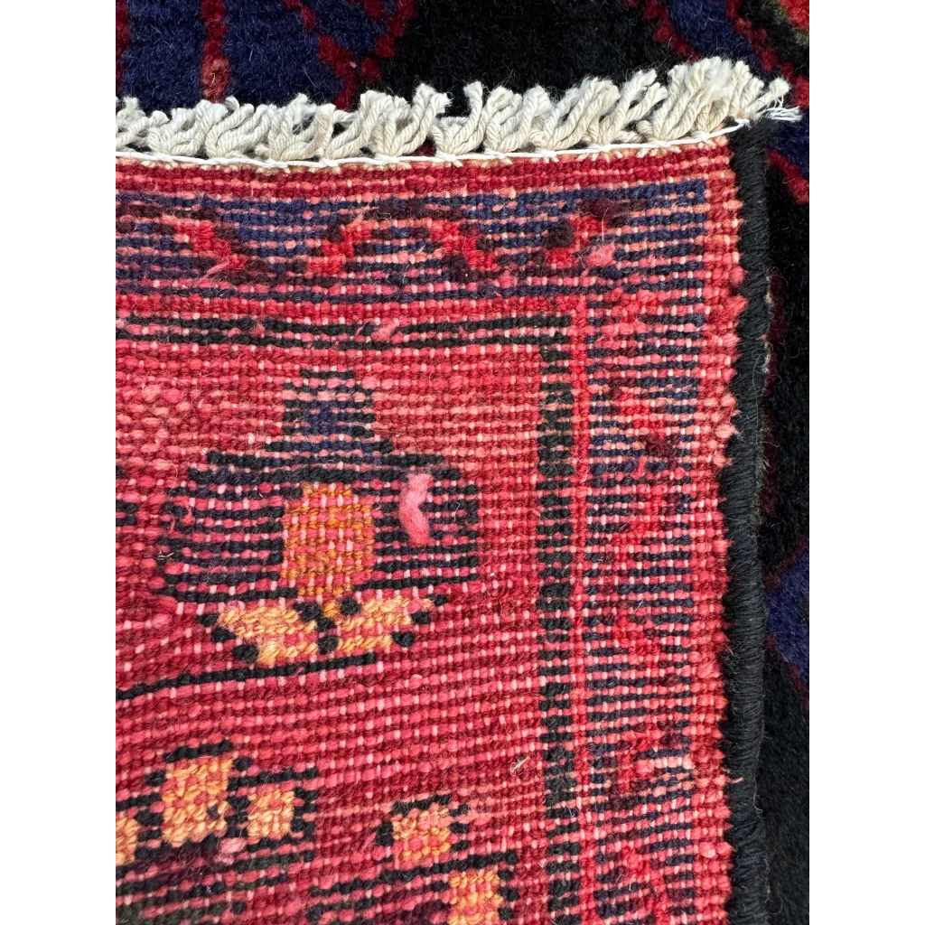 Vibrant Persian tribal Hamadan runner rug with red geometric patterns