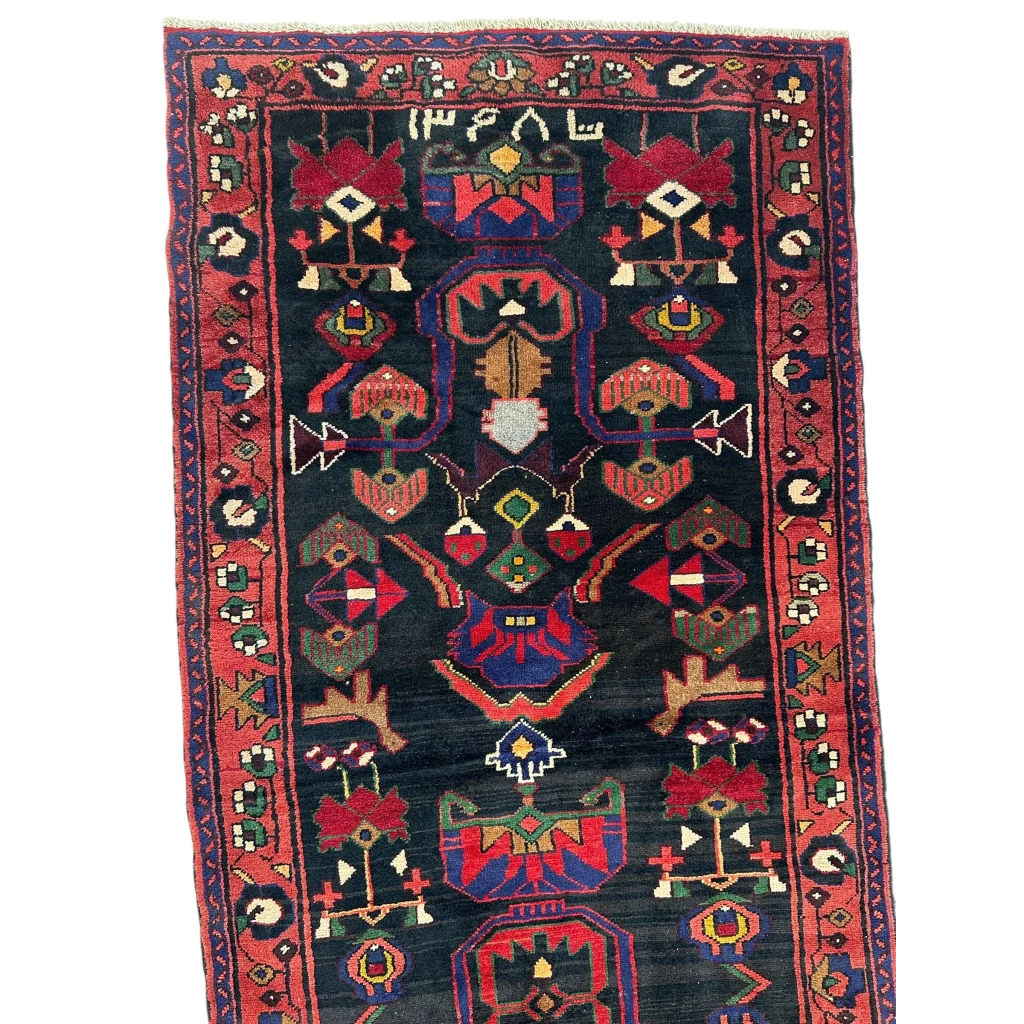 Dark blue Persian tribal Hamadan runner rug with red geometric patterns