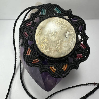 Hand woven flower necklace with jasper cabochon in black macrame frame