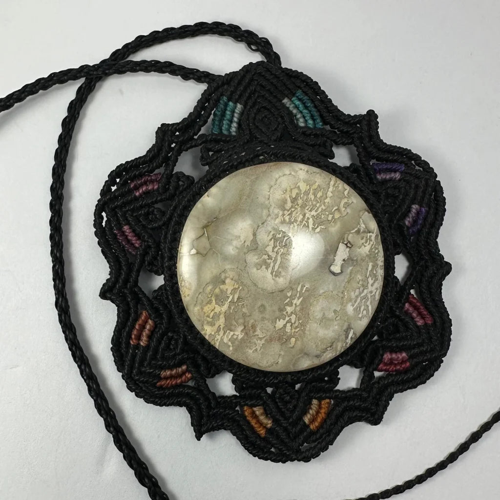 Hand woven flower necklace with jasper cabochon in black macrame
