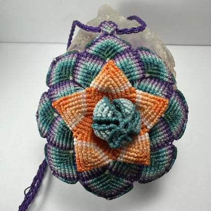 Hand woven flower necklace with vibrant macrame blooms