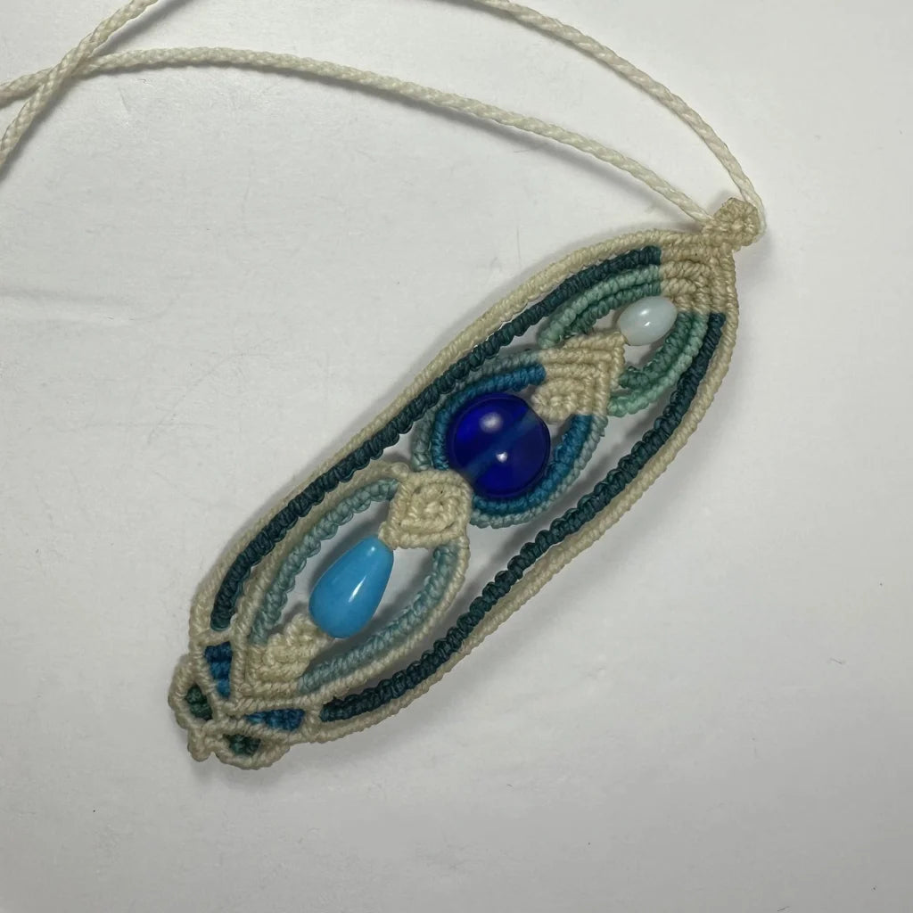 Handcrafted macrame necklace with turquoise glass beads