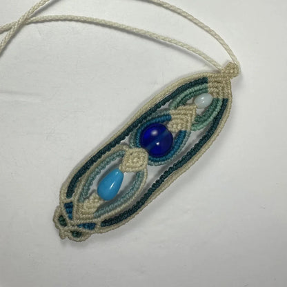 Handcrafted macrame necklace with turquoise glass beads