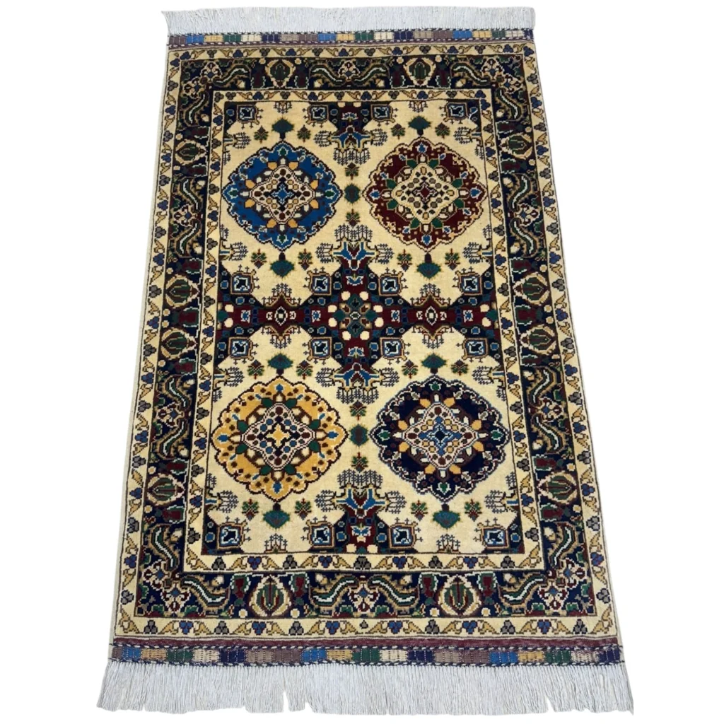 Handmade Afghan Kashi rug in beige with geometric floral patterns on cotton foundation