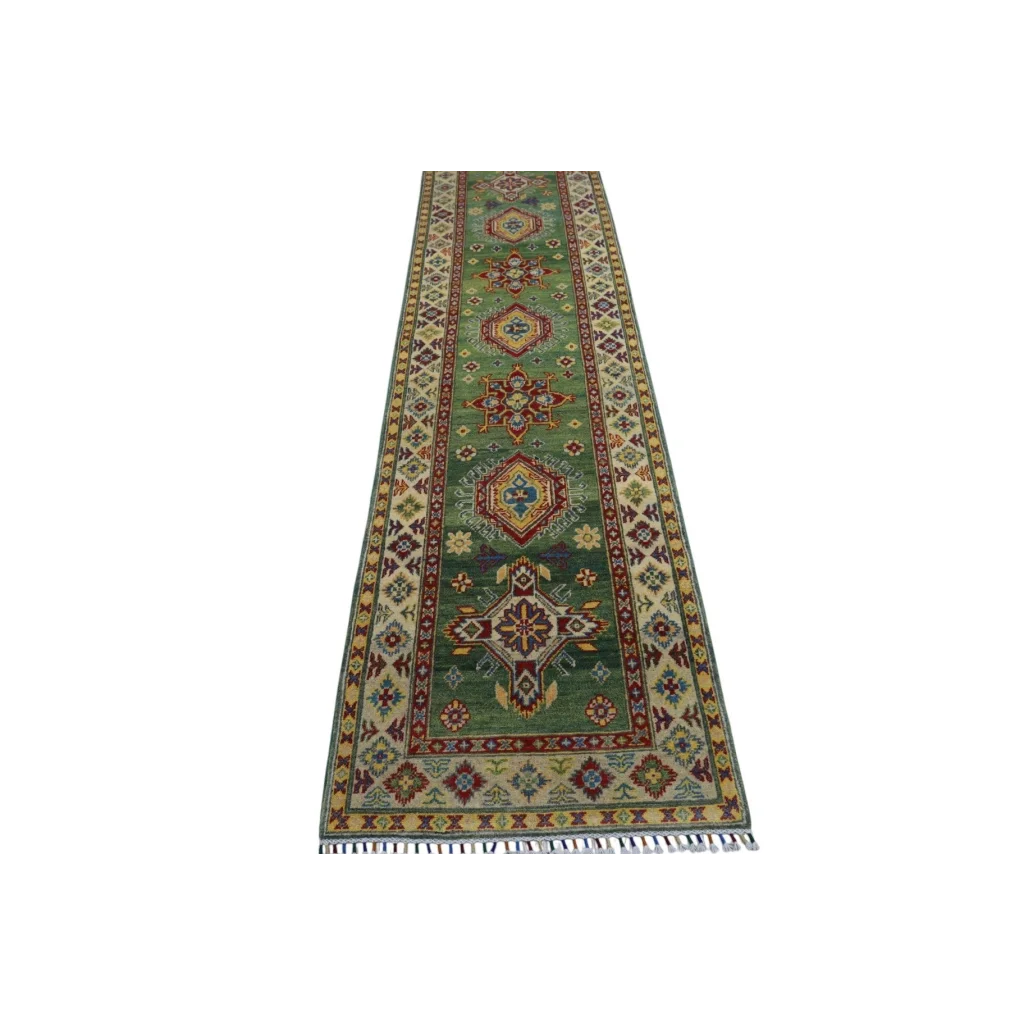 Handmade Afghan Kazak wool runner with cotton foundation, green with red, beige, gold geometric and floral patterns, fringed edge