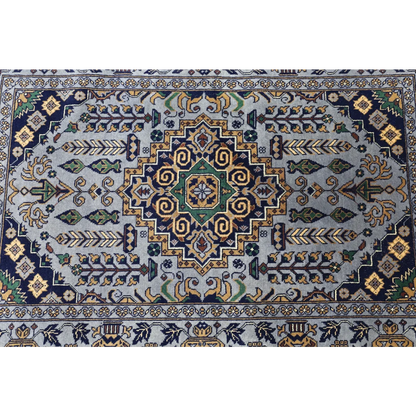 Handmade Afghan Zerkhaki rug in gray navy with gold geometric patterns on cotton foundation