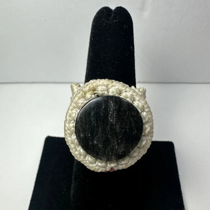 Chunky handmade woven ring with off-white crochet and black stone center