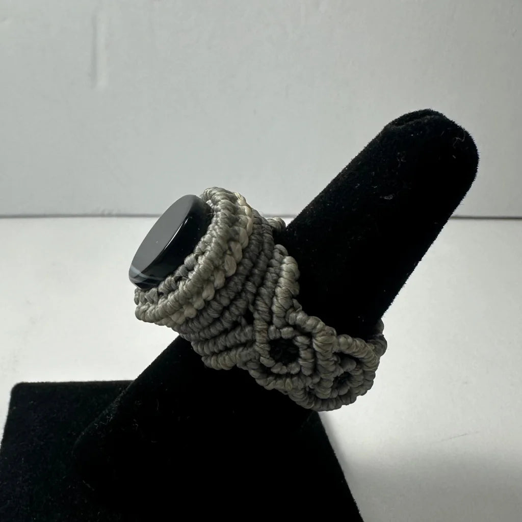 Handmade woven ring with gray macrame and black stone accent