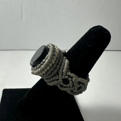 Handmade woven ring with gray macrame and black stone accent