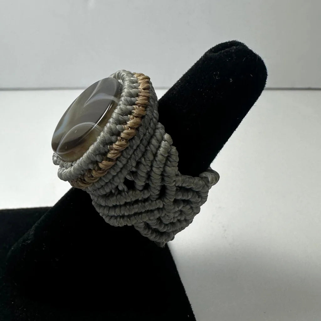 Handmade woven ring with translucent gray stone in tan cord band