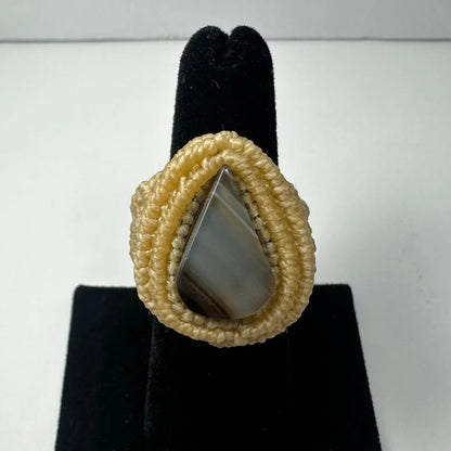 Handmade woven ring with teardrop gray stone in macrame cord