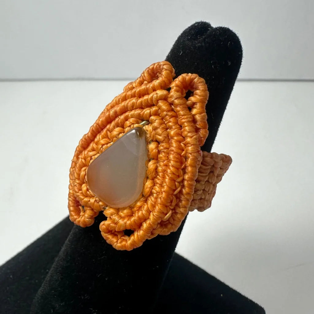 Handmade woven ring with orange macrame and teardrop stone