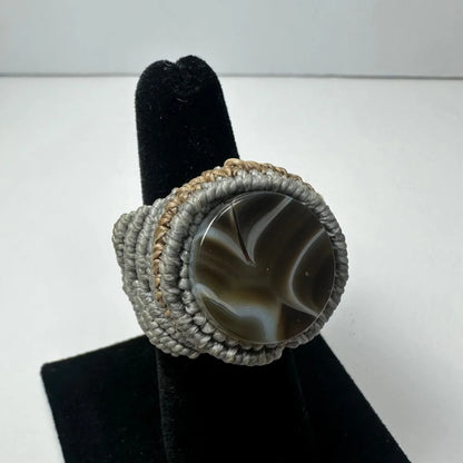 Handmade woven ring with swirling gray white agate in macrame band