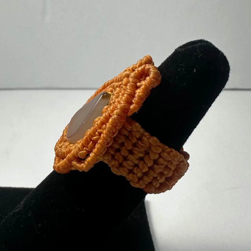 Handmade woven ring with orange macrame and translucent teardrop stone