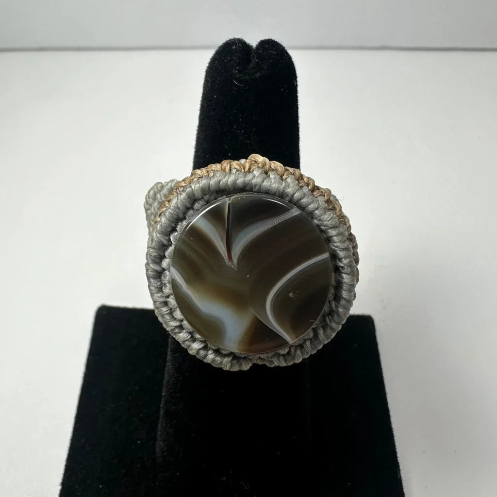 Handmade woven ring with swirling gray-white agate stone center