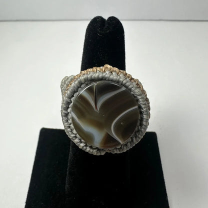 Handmade woven ring with swirling gray-white agate stone center
