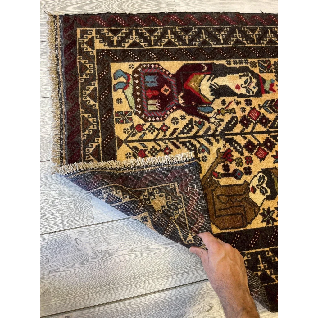 Handwoven geometric figures rug in rich burgundy, yellow, brown tones