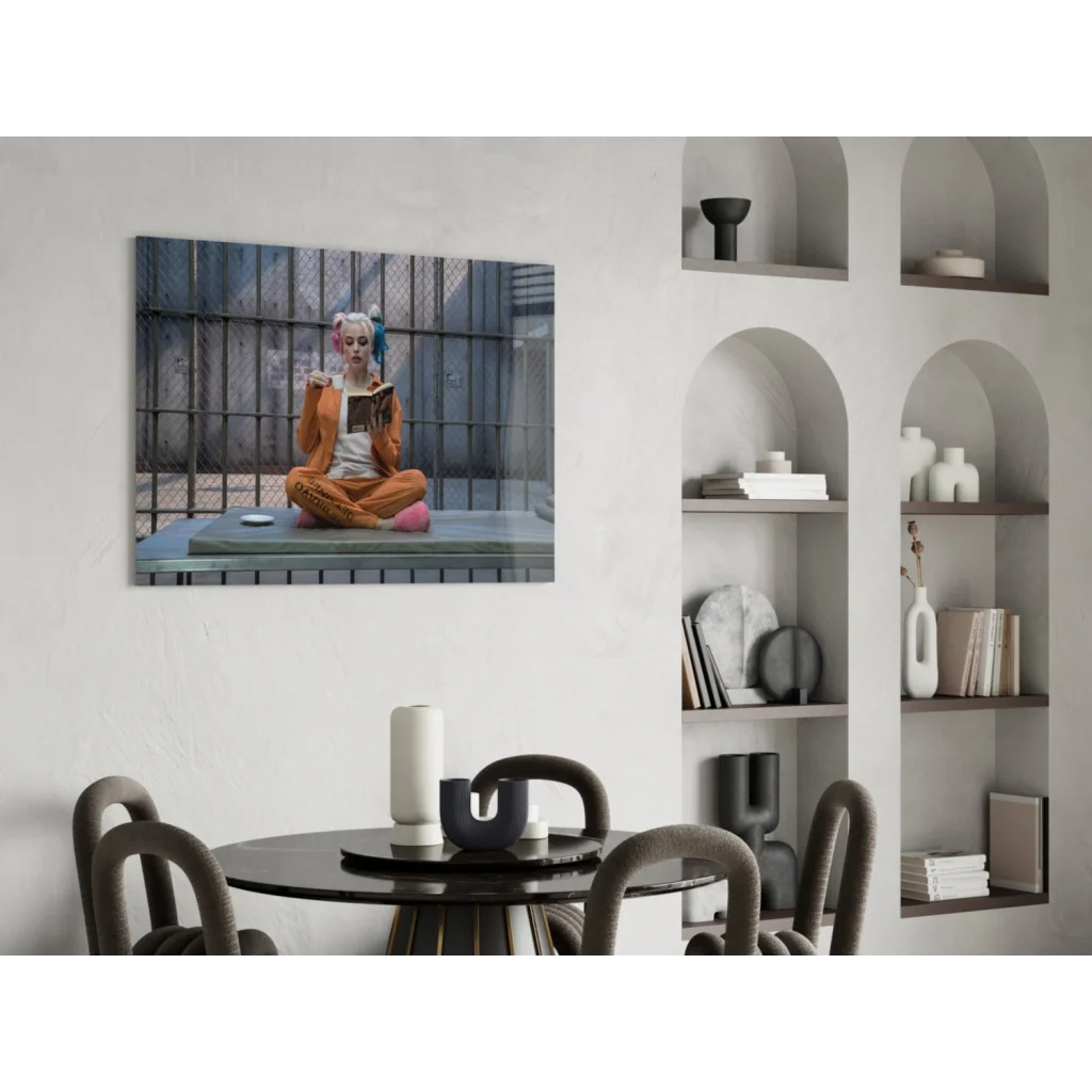 Harley Quinn in orange jumpsuit reading in prison cell wall art print