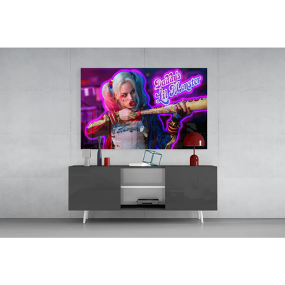 Vibrant Harley Quinn neon glass wall art print above gray console